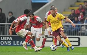 SC Braga V Arsenal 2010-11 Prints: Gibbs vs. Garcia: Arsenal's Defensive Battle at Braga's Fortress