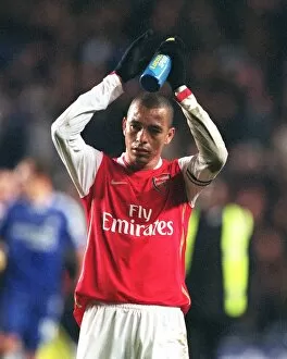 Images Dated 11th December 2006: Gilberto (Arsenal) claps the fans at the end of the match