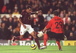 Arsenal v Sparta Prague (2005-6) Collection: Gilberto (Arsenal) Jaromir Blazek (Sparta). Arsenal 3: 0 Sparta Prague