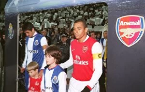 Images Dated 7th December 2006: Gilberto (Arsenal) Lucho Gonzalez (Porto) lead out their teams