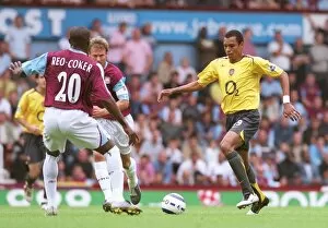 Images Dated 26th September 2005: Gilberto (Arsenal) Nigel Reo-Coker (West Ham). West Ham United 0: 0 Arsenal