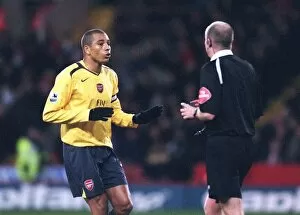 Gilberto (Arsenal) with referee A