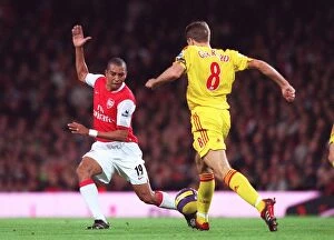 Arsenal v Liverpool 2006-07 Collection: Gilberto (Arsenal) Steven Gerrard (Liverpool)