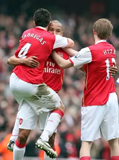 Gilberto celebrates scoring Arsenals 2nd goal with Cesc Fabregas and Alex Hleb