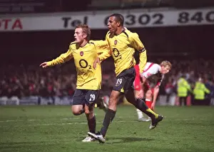 Gilberto celebrates scoring Arsenals 2nd goal with Sebastian Larsson