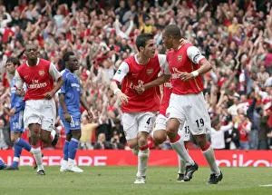 Gilberto celebrates scoring Arsenals goal with Cesc Fabregas