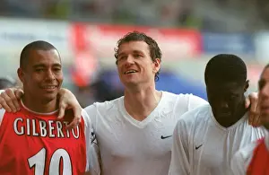 Gilberto, Jens Lehmann and Kolo Toure (Arsenal) celebrate winning the league