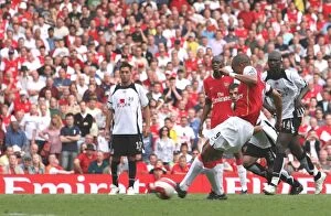 Gilberto shoots past Fulham goalkeeper Antti Niemi to score the 3rd Arsenal goal from the penalty spot