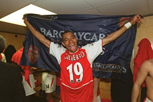 Tottenham V Arsenal Prints: Gilbertos (Arsenal) celebrates winning the league. Tottenham Hotspur v Arsenal