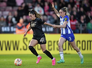 Brighton & Hove Albion Women v Arsenal Women 2022-23 Collection: Gio Queiroz Faces Pressure from Poppy Pattinson in Arsenal's Women's Super League Clash against