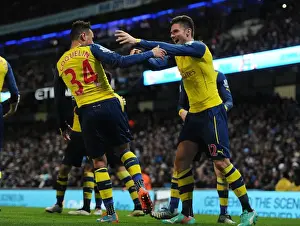 Manchester City V Arsenal 2014-15 Prints: Giroud and Coquelin's Euphoric Goal Celebration: Arsenal's Victory Moment Against Manchester City (2014-15)