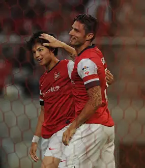 Nagoya Grampus V Arsenal 2013-14 Prints: Giroud and Miyaichi Celebrate First Goal for Arsenal in Nagoya Grampus Match, 2013