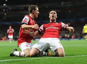 Arsenal V Borussia Dortmund 2013-14 Prints: Giroud and Ramsey Celebrate Arsenal's Goal Against Borussia Dortmund in the 2013-14 UEFA Champions League