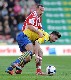 Stoke City V Arsenal 2013-14 Prints: Giroud vs. Adam: Intense Battle in Stoke City vs. Arsenal Premier League Clash