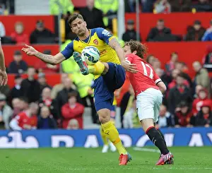 Manchester United V Arsenal 2014-15 Prints: Giroud vs Blind: A Premier League Battle at Old Trafford