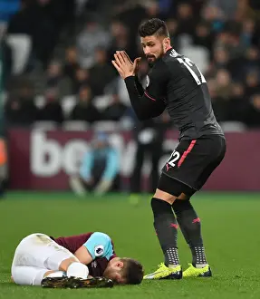 West Ham United V Arsenal 2017-18 Prints: Giroud vs. Cresswell: Intense Moment at the London Derby (West Ham United vs)