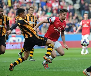 Hull City V Arsenal 2013/14 Prints: Giroud vs. Davies: Intense Battle at Hull City's KC Stadium (Arsenal vs)