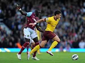 West Ham United V Arsenal 2012-13 Prints: Giroud vs Diame: Battle at the Boleyn Ground - Arsenal vs West Ham United