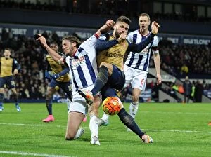 Images Dated 21st November 2015: Giroud vs Evans: A Premier League Battle - Intense Tackle Between Arsenal's Star Forward