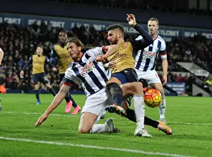 West Bromwich Albion V Arsenal 2015-16 Prints: Giroud vs Evans: A Premier League Tackle Battle at The Hawthorns