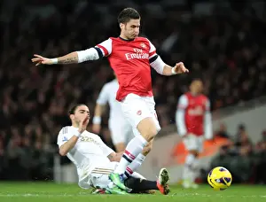 Arsenal V Swansea 2012-13 Prints: Giroud vs. Flores: Intense Battle at the Emirates - Arsenal v Swansea City