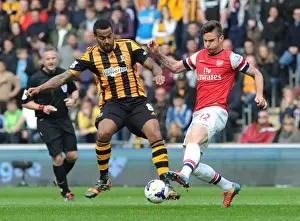 Hull City V Arsenal 2013/14 Prints: Giroud vs. Huddlestone: Intense Battle in Hull City vs. Arsenal Premier League Clash