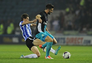 Giroud vs Hutchinson: A Fierce Rivalry in the Capital One Cup - Arsenal vs Sheffield Wednesday (2015-16)