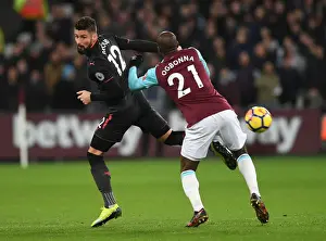 West Ham United V Arsenal 2017-18 Prints: Giroud vs Ogbonna: A Football Showdown at London Stadium - West Ham United vs Arsenal
