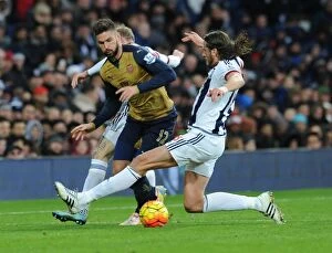 West Bromwich Albion v Arsenal 2015-16 Collection: Giroud vs Olsson: A Battle of Will in Arsenal's Victory over West Bromwich Albion (2015-16)