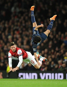 Arsenal V Manchester United 2013-14 Prints: Giroud vs. Rafael: A Clash at the Emirates - Arsenal vs