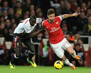 Arsenal V Liverpool 2013-14 Prints: Giroud vs. Sakho: Intense Battle at the Emirates - Arsenal v Liverpool