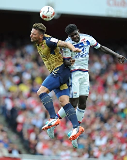Arsenal V Olympique Lyonnais - Emirates Cup 2015/16 Prints: Giroud vs. Umtiti: A Battle at the Emirates Cup