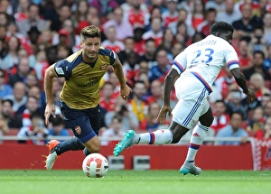 Arsenal V Olympique Lyonnais - Emirates Cup 2015/16 Prints: Giroud vs. Umtiti: A Tactical Clash at the Emirates Cup