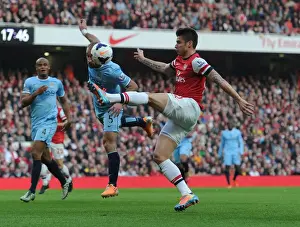 Arsenal V Manchester City 2013/14 Prints: Giroud vs. Zabaleta: A Premier League Battle at the Emirates