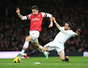 Arsenal V Swansea 2012-13 Prints: Giroud's Epic Battle: Outmaneuvering Chico Flores at Emirates Stadium
