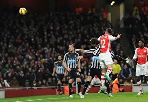 Arsenal v Newcastle United 2014/15 Collection: Giroud's Last-Minute Goal: Arsenal Edge Past Newcastle in Premier League Thriller
