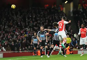 Arsenal V Newcastle United 2014/15 Prints: Giroud's Last-Minute Goal: Arsenal Edge Past Newcastle in Premier League Thriller