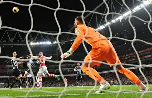 Arsenal V Newcastle United 2014/15 Prints: Giroud's Last-Minute Strike: Arsenal Edge Past Newcastle in Premier League Thriller