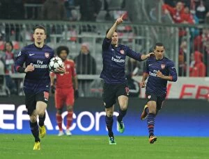 German Soccer League Collection: Glory for Arsenal: Unforgettable Goal by Giroud and Walcott vs. Bayern Munich