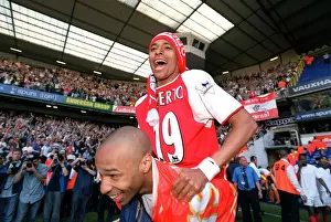 Tottenham V Arsenal Prints: Glory Days: Gilberto and Henry's Unforgettable Victory Celebration at White Hart Lane