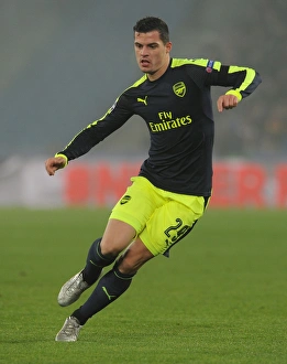 FC Basel V Arsenal 2016-17 Prints: Granit Xhaka in Action: Arsenal vs