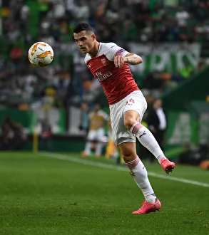 Sporting Lisbon V Arsenal 2018-19 Prints: Granit Xhaka in Action: Arsenal vs. Sporting CP, UEFA Europa League 2018-19