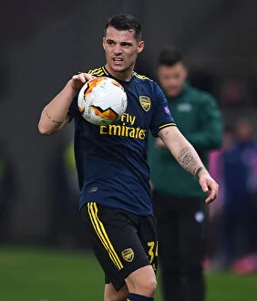 Olympiacos v Arsenal 2019-20 Collection: Granit Xhaka in Action: Arsenal vs. Olympiacos, Europa League Round of 32 (2020)