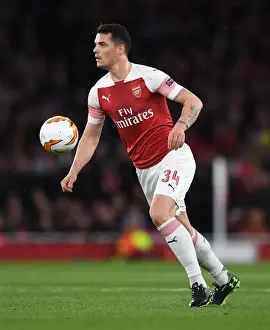 Arsenal V Valencia 2018-19 Prints: Granit Xhaka in Action: Arsenal's Europa League Battle against Valencia