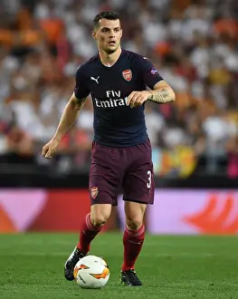 Valencia CF V Arsenal 2018-19 Prints: Granit Xhaka in Action: Arsenal's Europa League Showdown vs Valencia