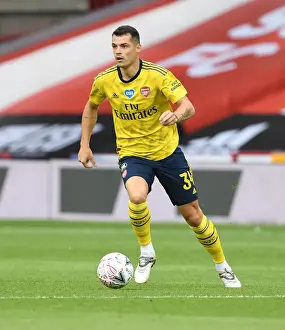 Granit Xhaka in Action: Arsenal's FA Cup Battle against Sheffield United