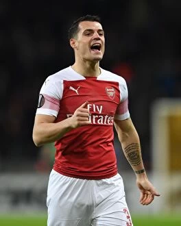 Images Dated 14th February 2019: Granit Xhaka in Action: Arsenal's Midfield Maestro Shines in UEFA Europa League Clash against BATE