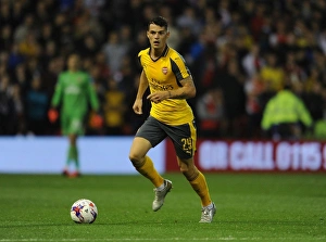 Nottingham Forest V Arsenal EPL Cup 3rd Round 2016-17 Prints: Granit Xhaka in Action: Arsenal's Midfield Maestro Shines Against Nottingham Forest in EFL Cup (2016-17)