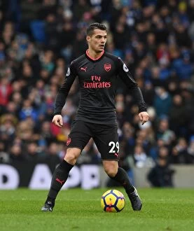 Images Dated 4th March 2018: Granit Xhaka in Action: Brighton & Hove Albion vs. Arsenal, Premier League 2017-18