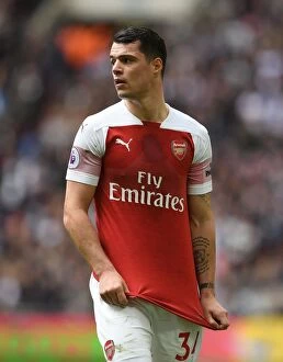 Images Dated 2nd March 2019: Granit Xhaka in Action: Tottenham Hotspur vs. Arsenal FC, Premier League 2018-19